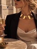 Louis Vuitton Gold-Tone Statement Collar editorial image