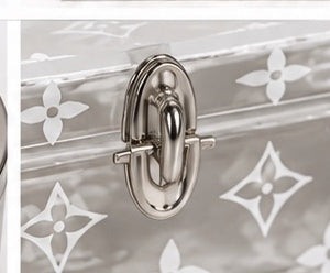 Louis Vuitton plexiglass box clasp detail